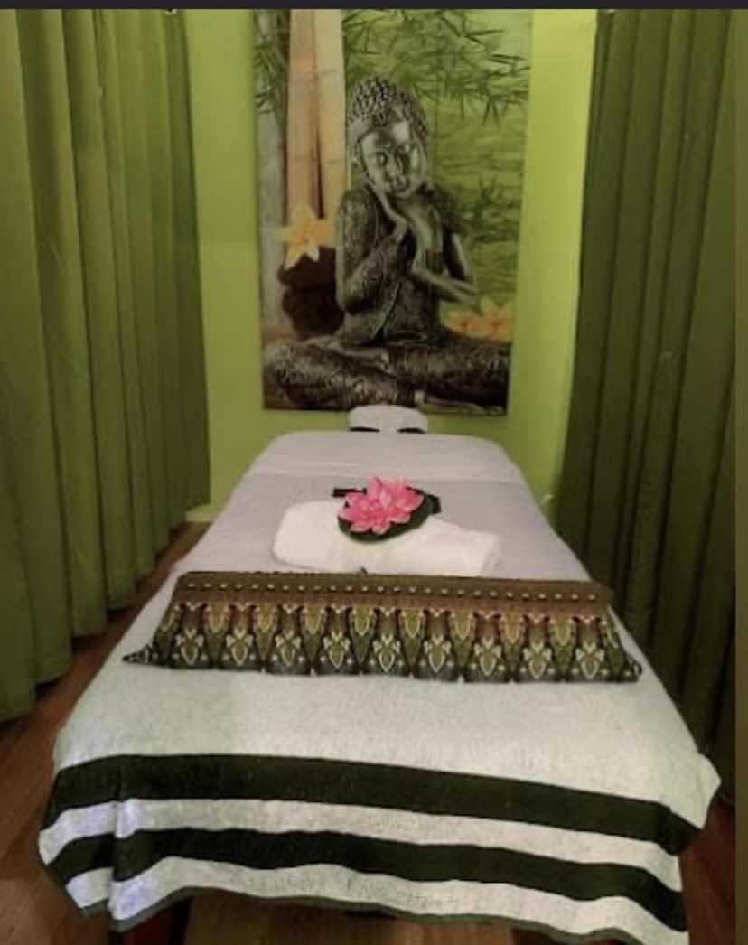 Diana's massage room with Buddha painting and zen ambiance